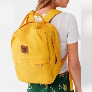 Fjallraven yellow backpack in great condition !